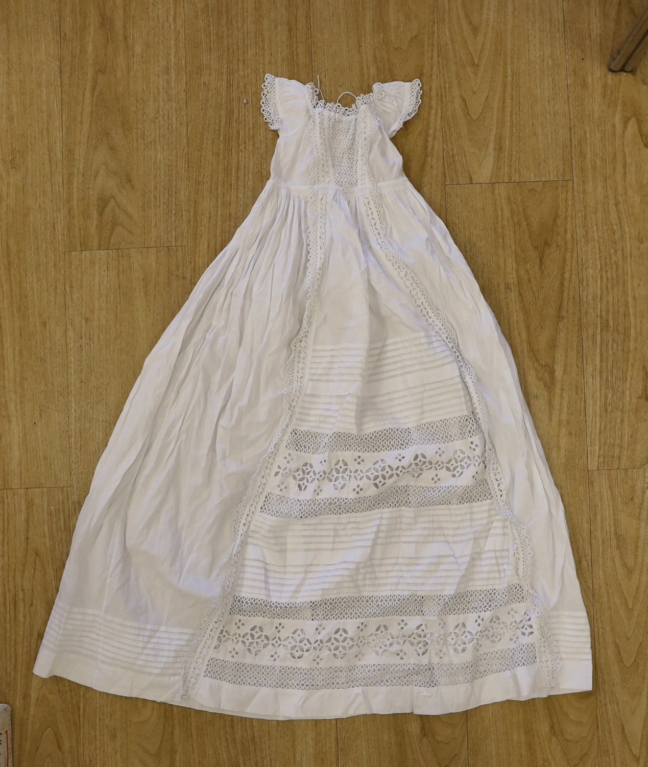 A collection of 19th century cutwork and Ayrshire christening gowns